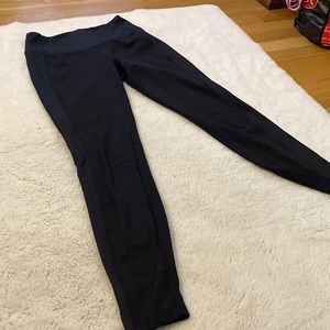 High rise, black new balance leggings.